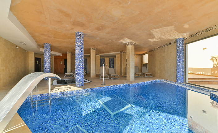 Spa area with views of the outdoor pool